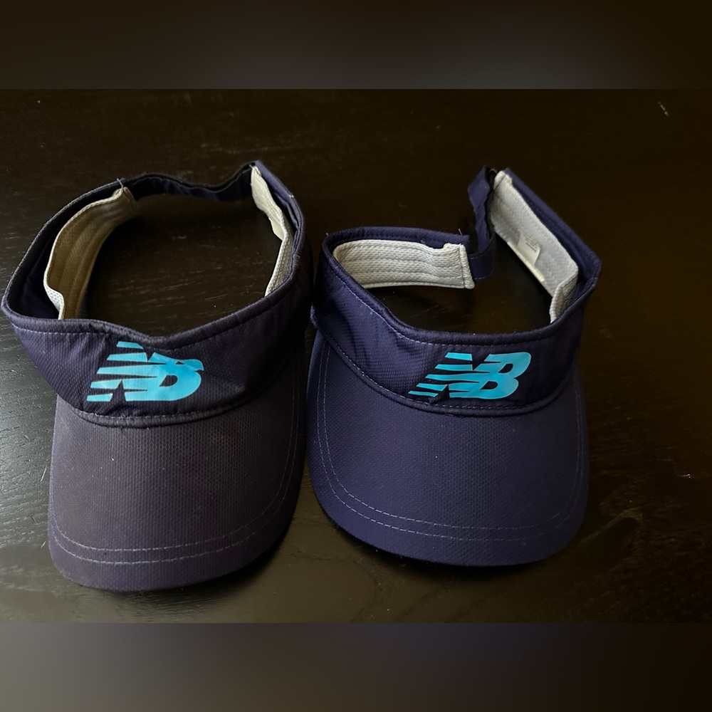 2 New Balance navy blue visors